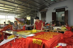 Trade village busy making flags ahead of general election