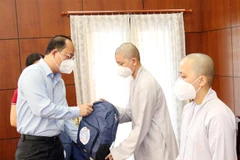 Religious volunteers join health workers in COVID-19 fight