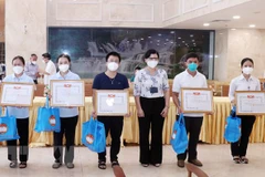 HCM City honours Catholic volunteers for COVID-19 control
