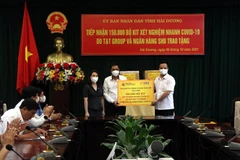 Businesses donate 150,000 COVID-19 rapid test kits to Hai Duong