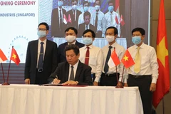 Electricity corporation, Singaporean group sign strategic cooperation agreement
