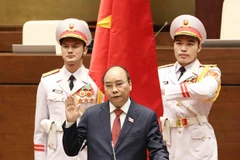 Leaders of countries, WEF congratulate new leaders of Vietnam