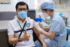 COVID-19 vaccination for French nationals underway in HCM City