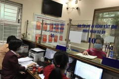 Hanoi workers return to work after Tet