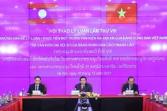 Vietnamese, Lao Parties hold eighth theoretical workshop via videoconference