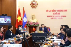 Vietnam, Laos talk enhancement of labour, social welfare cooperation