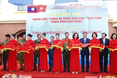 Exhibition spotlights friendship of Vietnamese, Lao public security forces