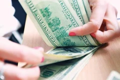 Reference exchange rate revised up 3 VND 