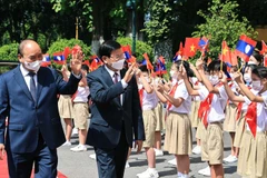 Top Lao leader’s visit to Vietnam grabs Lao headlines
