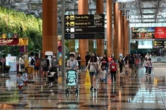 Singapore stops covering COVID-19 costs for unvaccinated people
