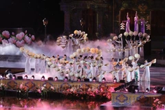 An art performance at the event. (Photo: VNA)
