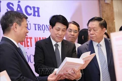At the book display area (Photo: VNA)