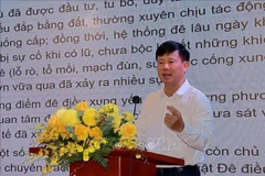 Director of the Department of Dike Management and Disaster Prevention Pham Duc Luan speaks at the event. (Photo: VNA)