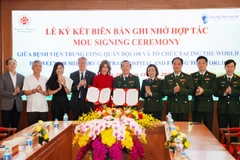 At the MoU signing ceremony (Photo: VNA)