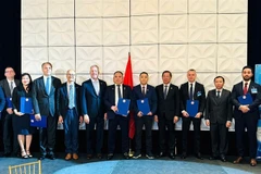 HCM City and US entities and businesses exchange cooperation memoranda. (Photo baodautu.vn)