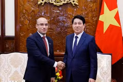 State President Luong Cuong (R) receives Algerian Ambassador to Vietnam Sofiane Chaib. (Photo: VNA)
