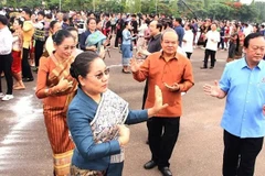 The traditional Lao Lamvong dance is widely practised among Lao people (Photo: Paxaxon)