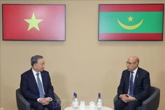 Party General Secretary and State President To Lam meets with President of Mauritania Mohamed Ould Ghazouani, in Paris on October 5. (Photo: VNA)