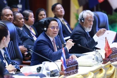 Prime Minister Pham Minh Chinh speaks at the plenary session of the 44th ASEAN Summit in Vientiane on October 9. (Photo: VNA)