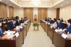 At the meeting (Photo: VNA)