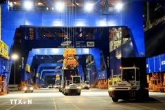 Transporting import and export containers at Gemalink International Port in Phu My town, Ba Ria-Vung Tau province (Photo: VNA)