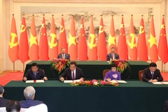 Vietnam and China will step up collaboration in social affairs and people’s livelihoods under a freshly-signed memorandum of understanding. (Photo: VNA)