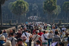 Tourists visit the Angkor Wat in Siem Reap province, Cambodia. (Photo: Xinhua)