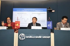 At the August 26 ceremony releasing the WB's latest bi-annual economic report on Vietnam Taking Stock. (Photo: VNA)