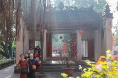 Many people visit Voi Phuc Temple on the third day of the Lunar New Year. (Photo: VNA)