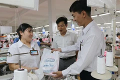 Rewards, bonuses for Lunar New Year festival bolster workers’ spirits 