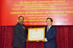 Former World Vision national director receives Friendship Medal