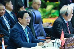 PM Pham Minh Chinh attends the 27th ASEAN - China Summit in Vientiane on October 10. (Photo: VNA)