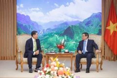 PM Pham Minh Chinh (right) receives Chairman of Hyosung Group Cho Hyun-joon in Hanoi on October 14. (Photo: VNA)