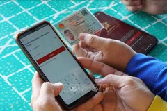 Hanoi is set to provide more public services via e-identification app VNeID. (Photo: VNA)