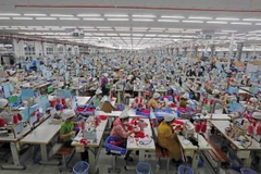 Production at SCAVI Hue in Thua Thien - Hue province. The S&P Global Vietnam Manufacturing Purchasing Manager’s Index (PMI) rose sharply to 54.7 in June from 50.3 in May. (Photo: VNA)