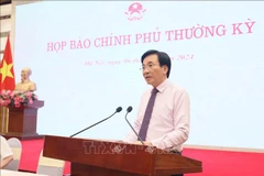 Minister - Chairman of the Government’s Office and Government Spokesman Tran Van Son addressed the press meeting on July 6. (Photo: VNA)