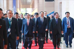 Vietnamese, Lao, Cambodian PMs discuss cooperation in working breakfast