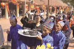 Villagers continue traditional rice cooking contest