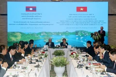 10th theoretical workshop of Vietnamese, Lao parties wraps up