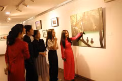 Photo exhibition tells stories about life along Mekong River’s banks