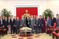Vietnamese, Lao Party commissions strengthen cooperation