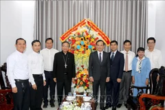 Deputy PM extends Christmas greetings in Binh Thuan, Dong Nai provinces