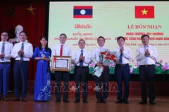 Vietnamese university honoured for training Lao health workers
