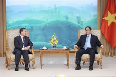 PM receives outgoing Lao ambassador