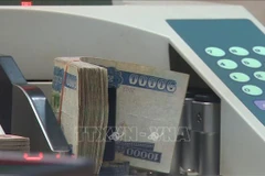 Laos to take stronger measures to spur economic growth