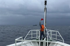 Fishing boat in distress towed to Song Tu Tay island