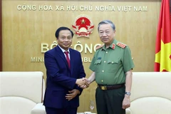 Vietnamese, Lao public security ministries step up cooperation 