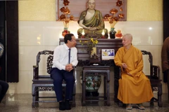HCM City officials extend Tet greetings to religious establishments
