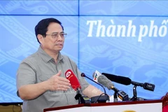 PM asks for more favourable policies to push up HCM City’s development