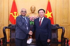 Politics academy, ADB seek stronger cooperation